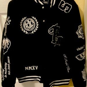 Medium Rebel Minds black varsity jacket